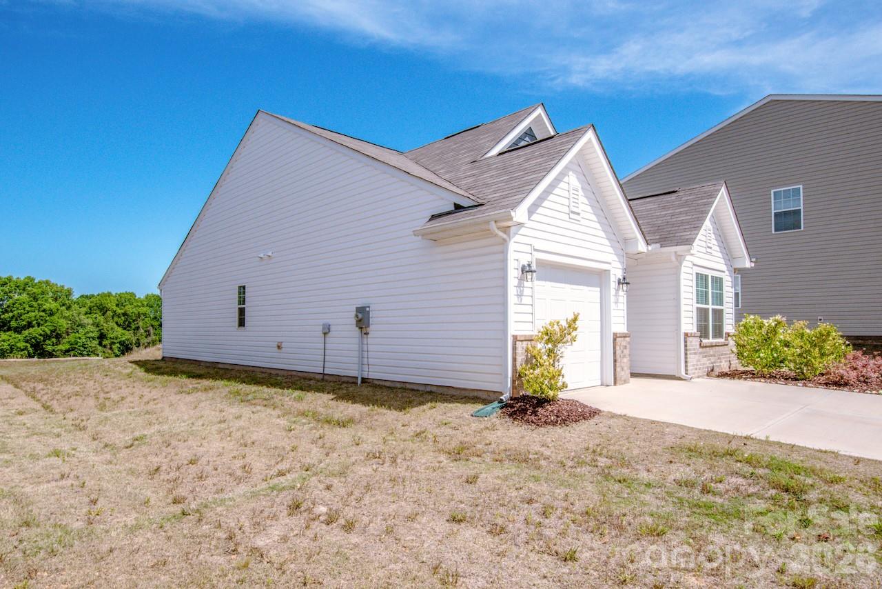 2742 Legacy Ridge Lane Catawba, NC 28609 - Photo 5 of 36 a view of a house with wooden fence