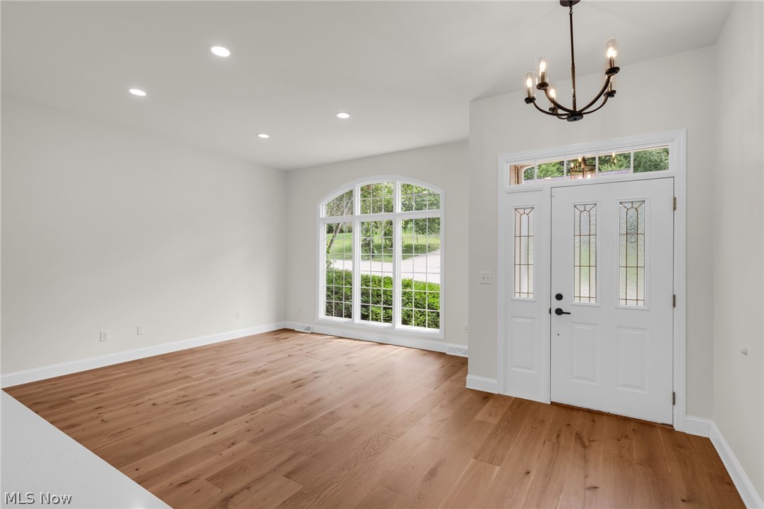 623 Bridgeview Avenue Chester, WV 26034 - Photo 2 of 47 Living room featuring hardwood floors and oversized windows