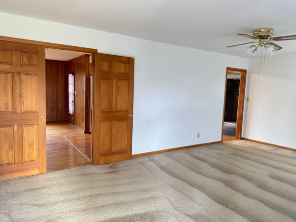 a view of a livingroom with a staircase