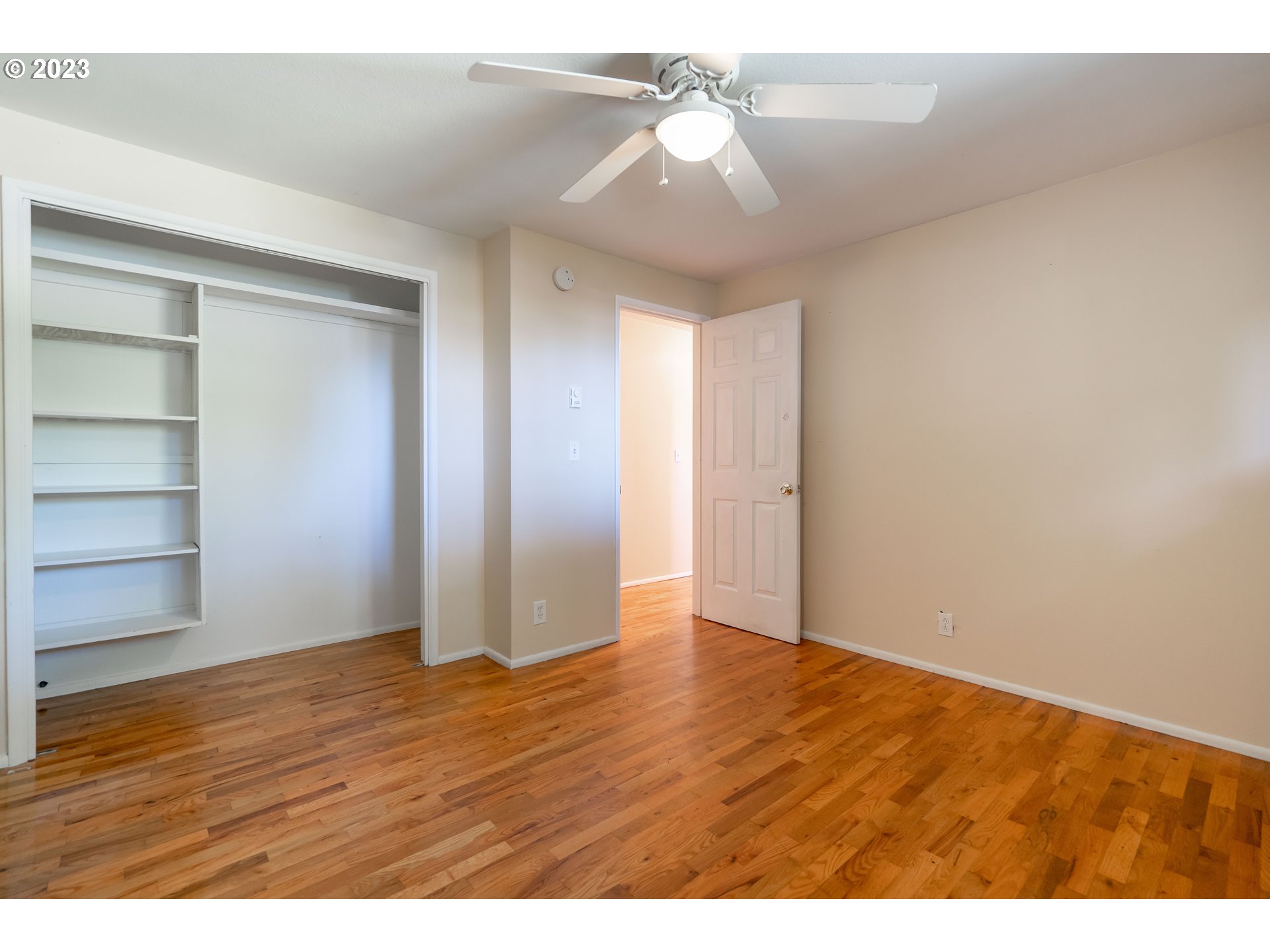 1670 Linden Avenue Springfield, OR 97477 - Photo 16 of 28 a view of an empty room with wooden floor