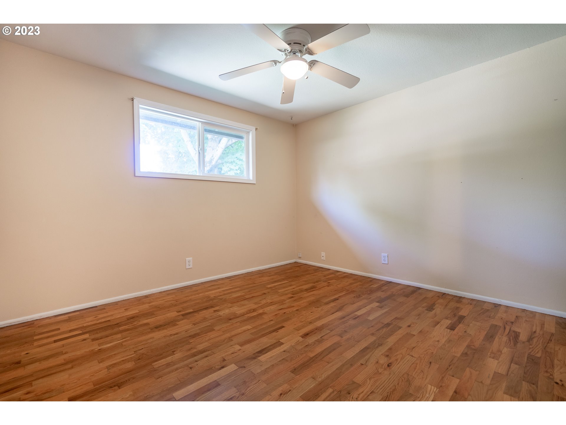 1670 Linden Avenue Springfield, OR 97477 - Photo 17 of 28 a view of an empty room with a chandelier fan