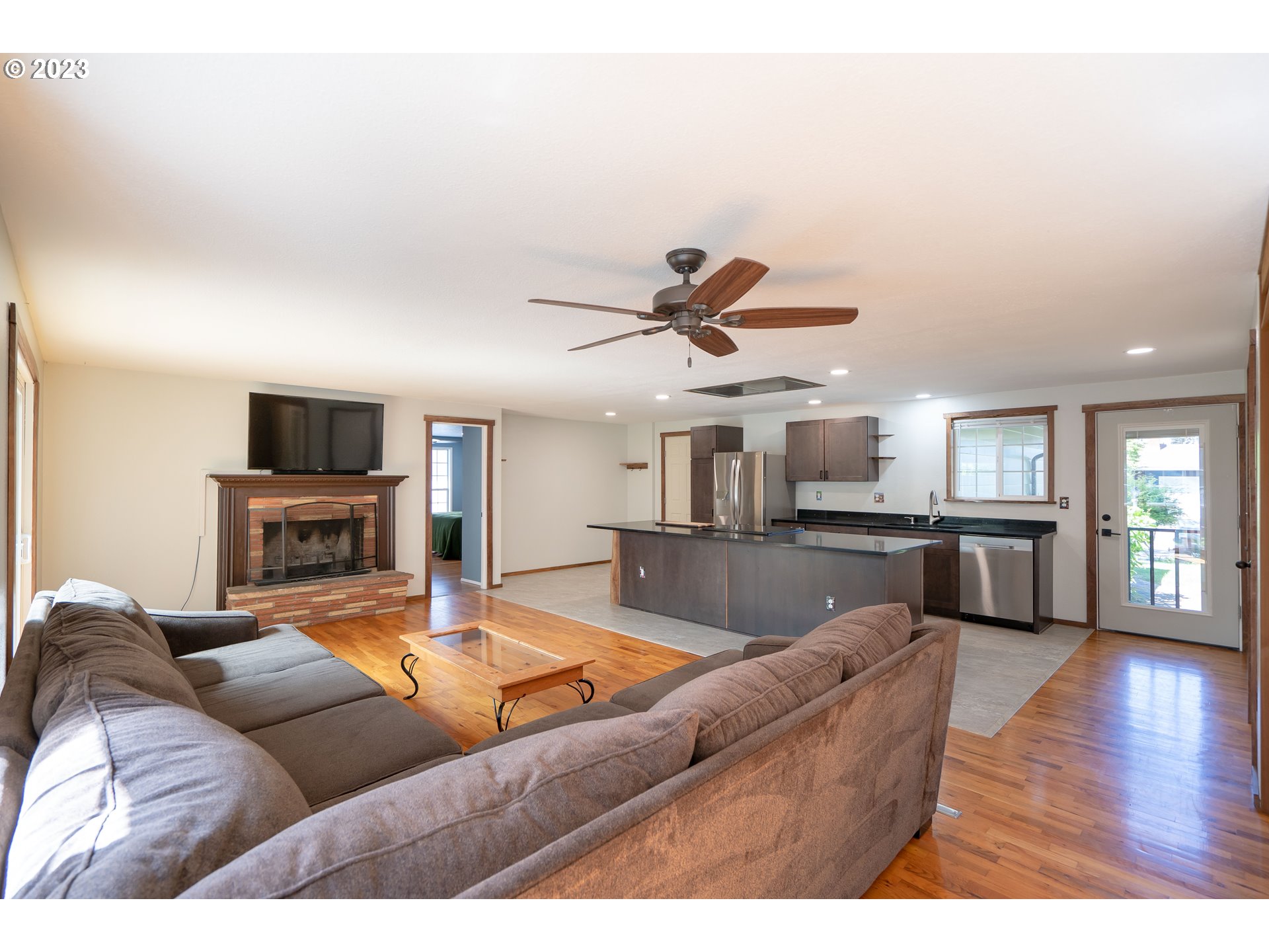 1670 Linden Avenue Springfield, OR 97477 - Photo 7 of 28 a living room with furniture and a flat screen tv