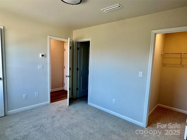 a bathroom with a toilet and a sink