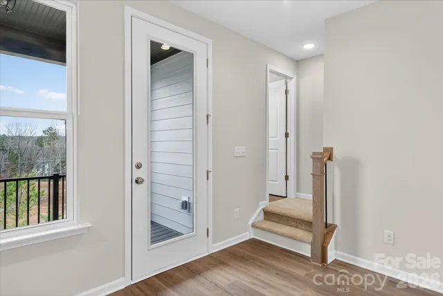 a view of front door with hallway
