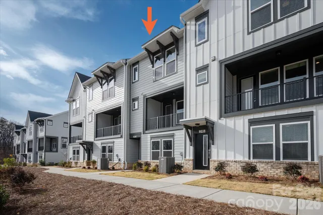 a front view of a building with street view