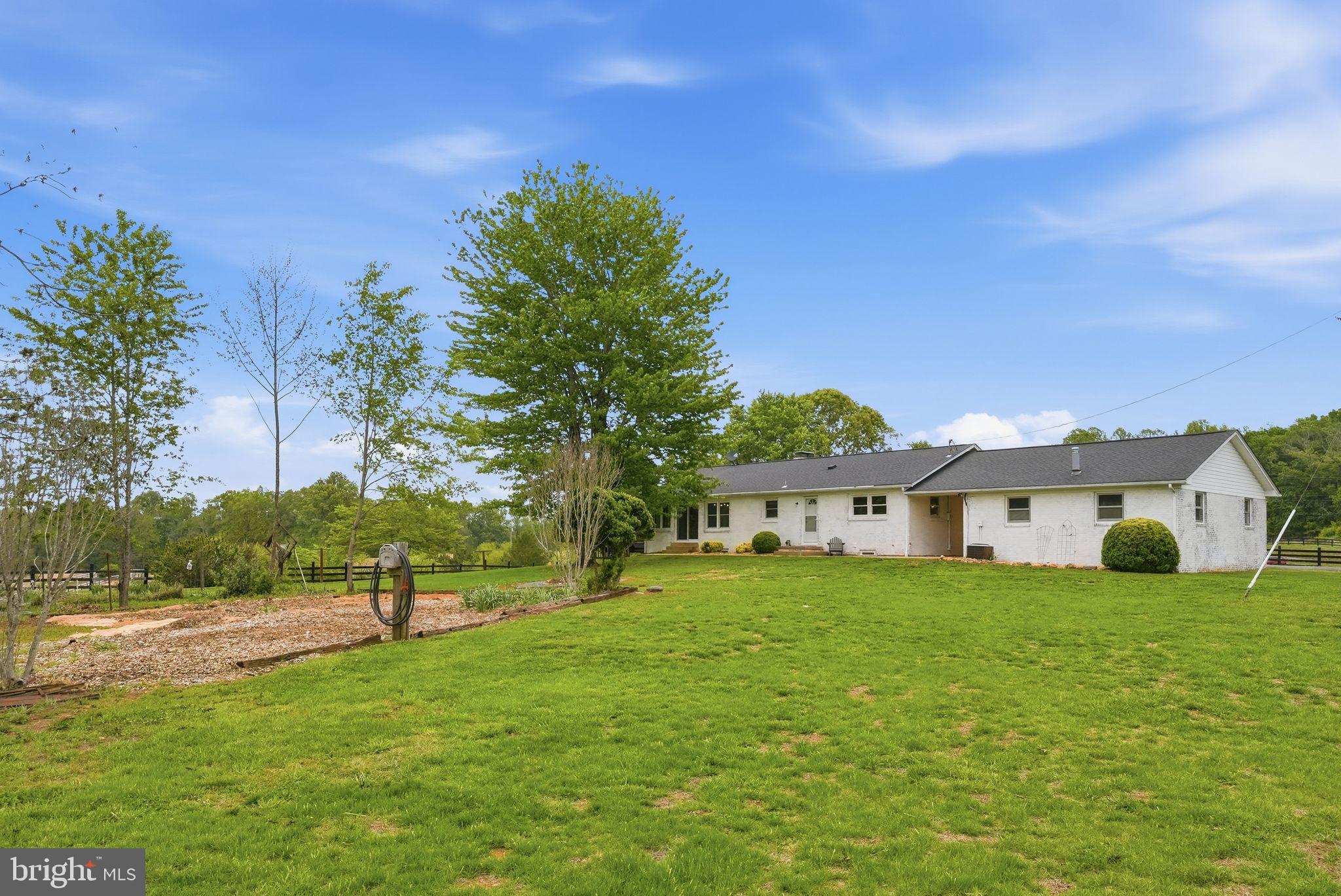 481 James City Road Leon, VA 22725 - Photo 70 of 89 a view of a house with a big yard and palm trees