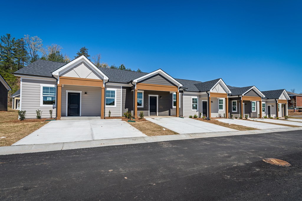 31 Grove Loop Blue Ridge, GA 30513 - Photo 7 of 47 a front view of a house with a yard and garage