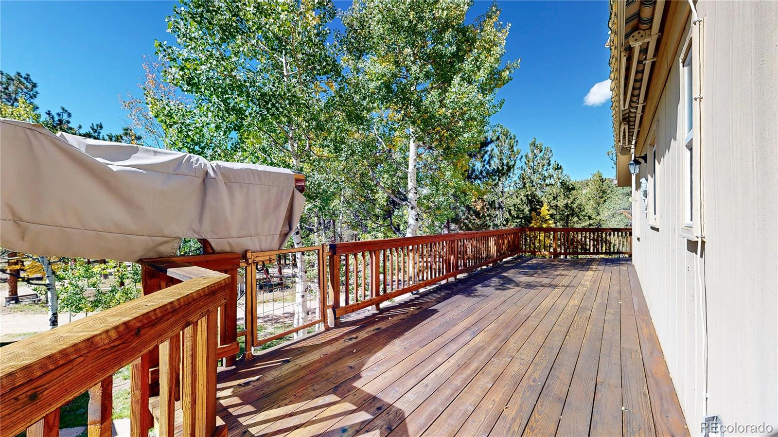 92 Four Bits Street Bailey, CO 80421 - Photo 33 of 50 a view of balcony with wooden floor