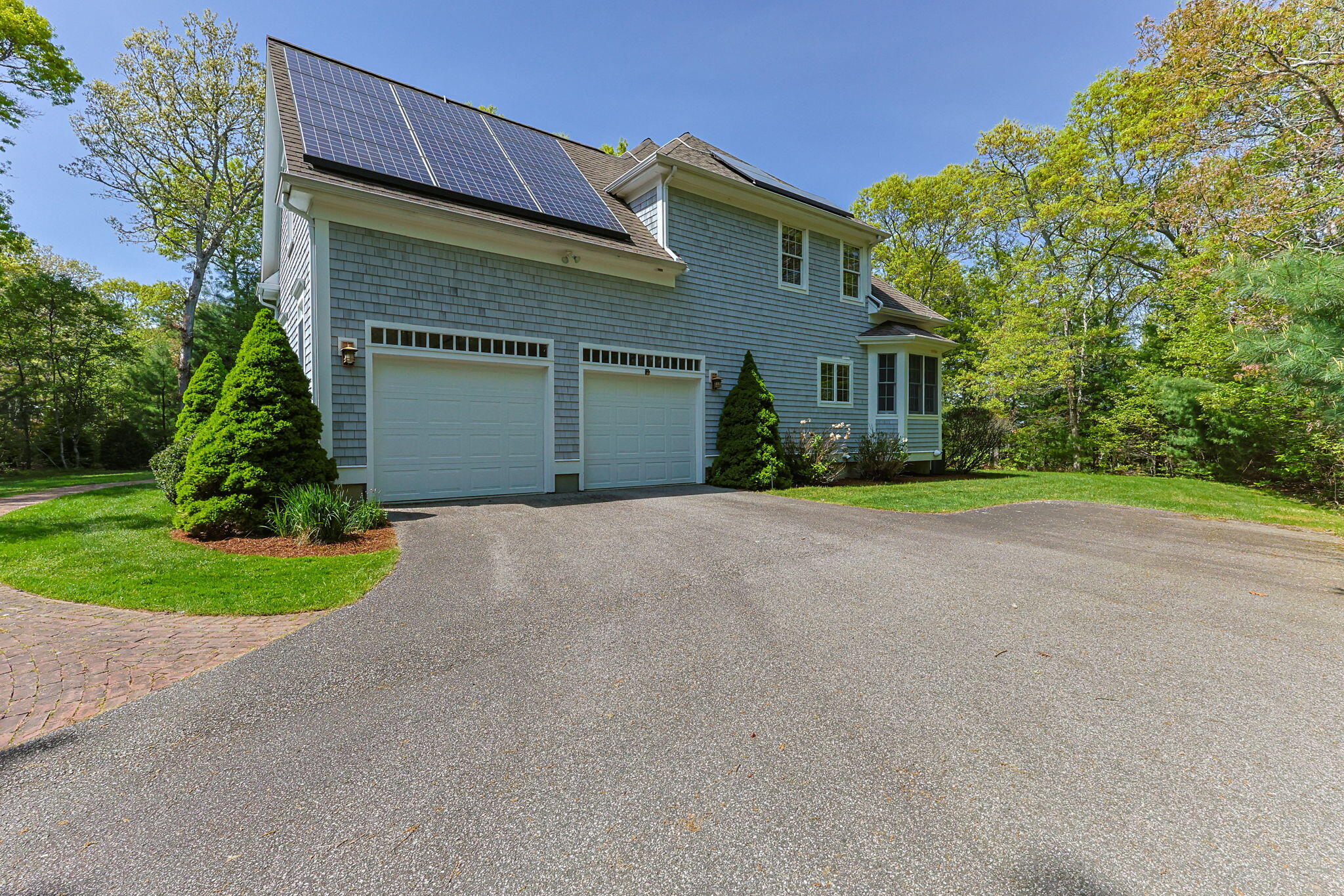 17 Payamps Road Mashpee, MA 02649 - Photo 15 of 72 a front view of house with yard and green space