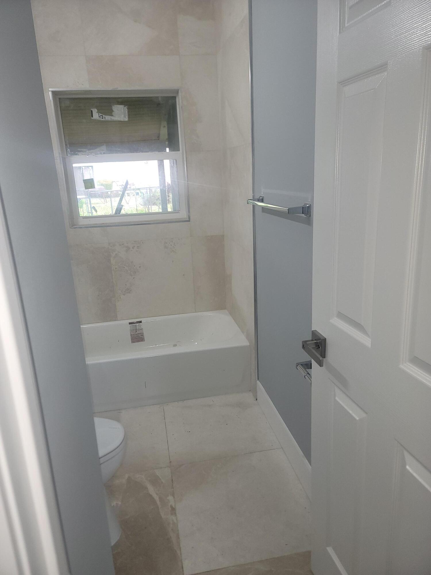 1122 West 26th Court Riviera Beach, FL 33404 - Photo 12 of 13 20250123_104529