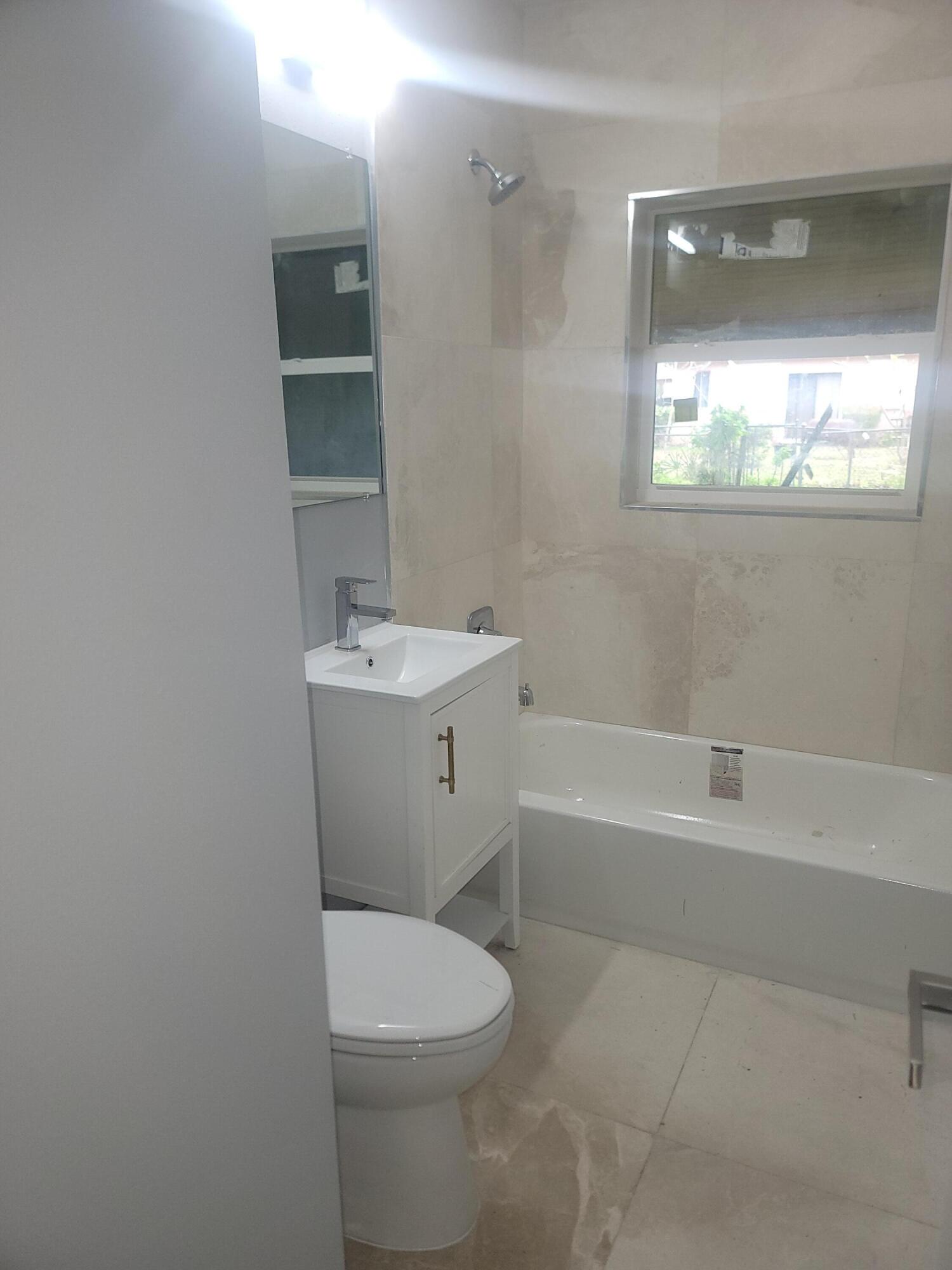 1122 West 26th Court Riviera Beach, FL 33404 - Photo 13 of 13 20250123_104536