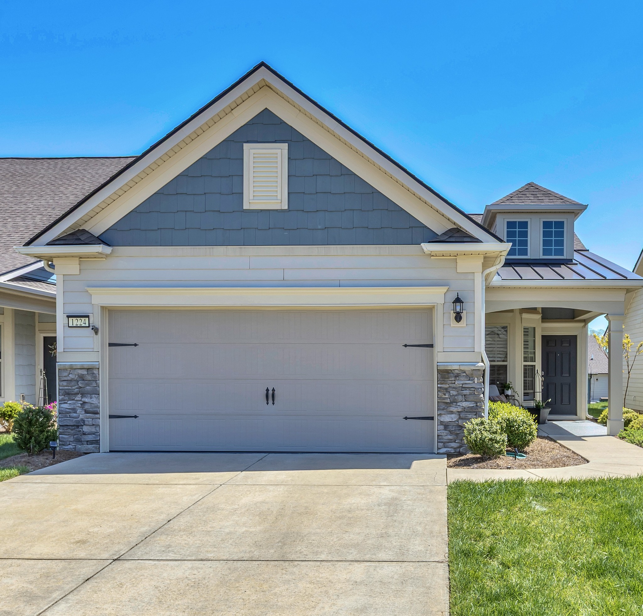 a front view of house with yard