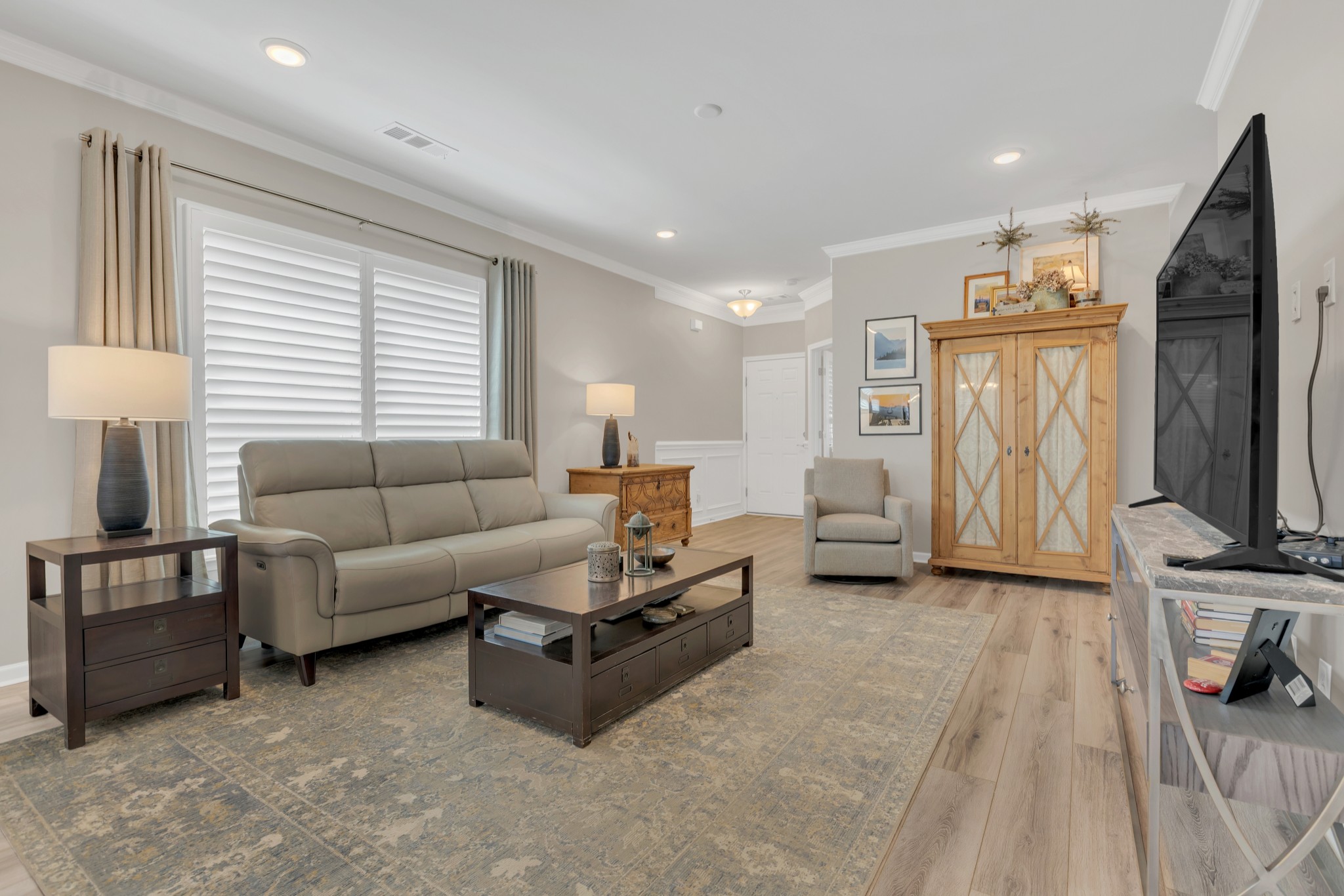 1224 Del Webb Boulevard Spring Hill, TN 37174 - Photo 11 of 47 a living room with furniture and a flat screen tv