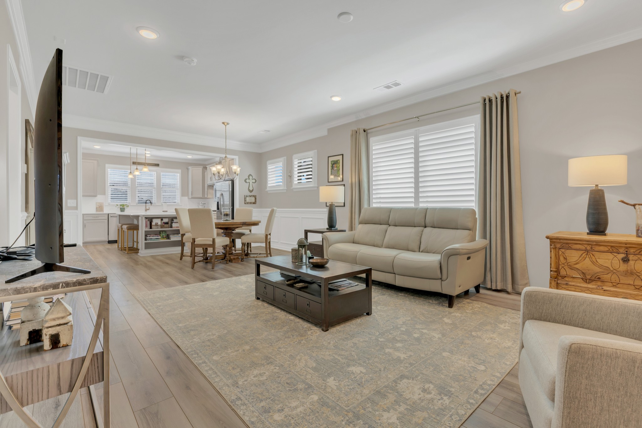 1224 Del Webb Boulevard Spring Hill, TN 37174 - Photo 12 of 47 a living room with furniture and a flat screen tv