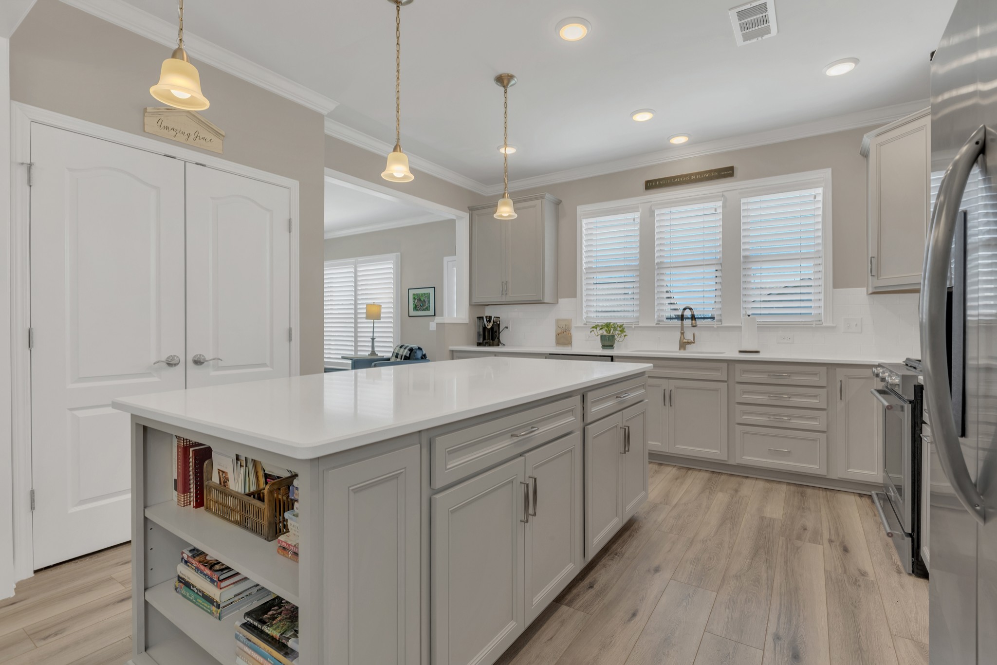 1224 Del Webb Boulevard Spring Hill, TN 37174 - Photo 15 of 47 a kitchen with a sink window and cabinets