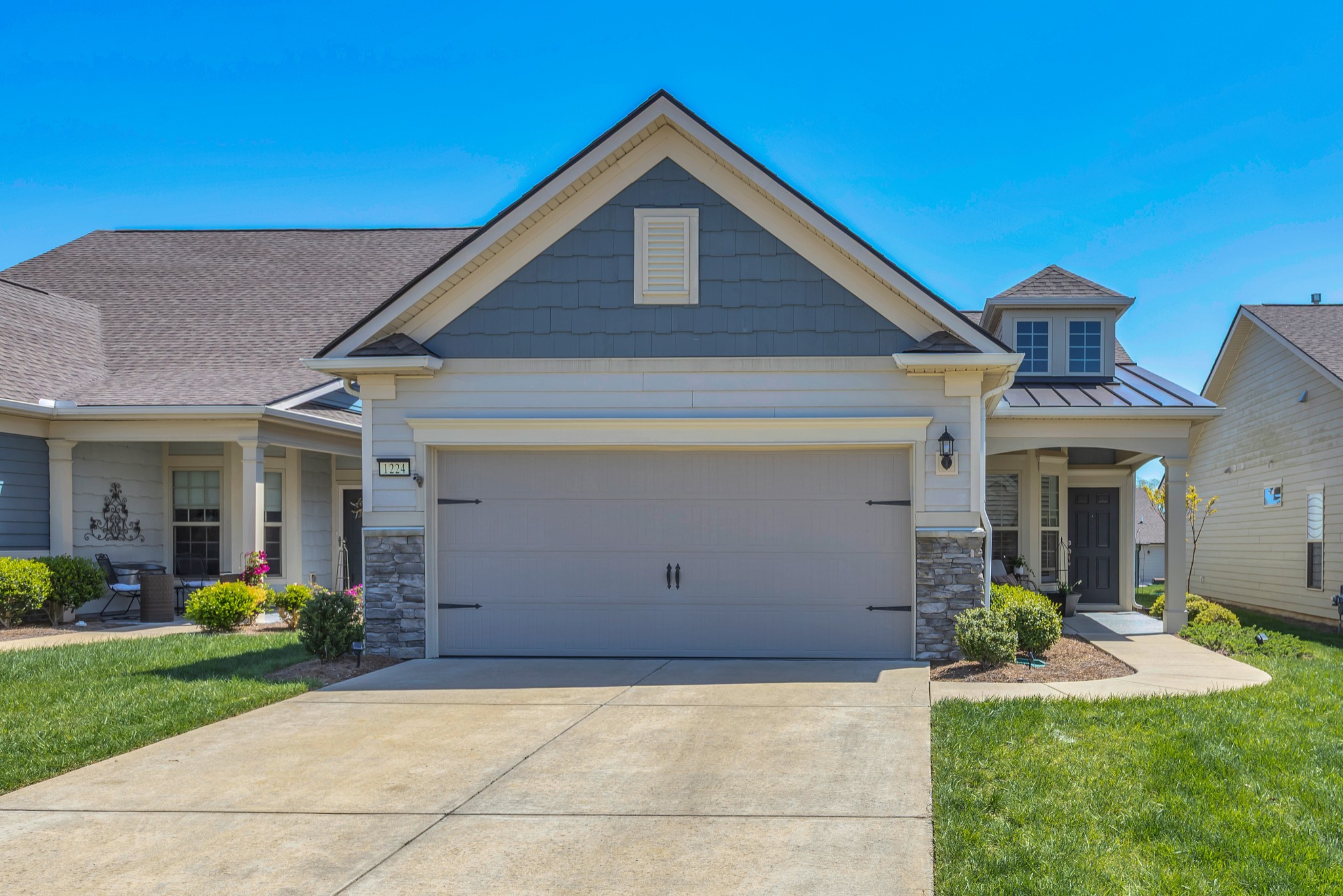1224 Del Webb Boulevard Spring Hill, TN 37174 - Photo 3 of 47 a front view of house with yard and green space
