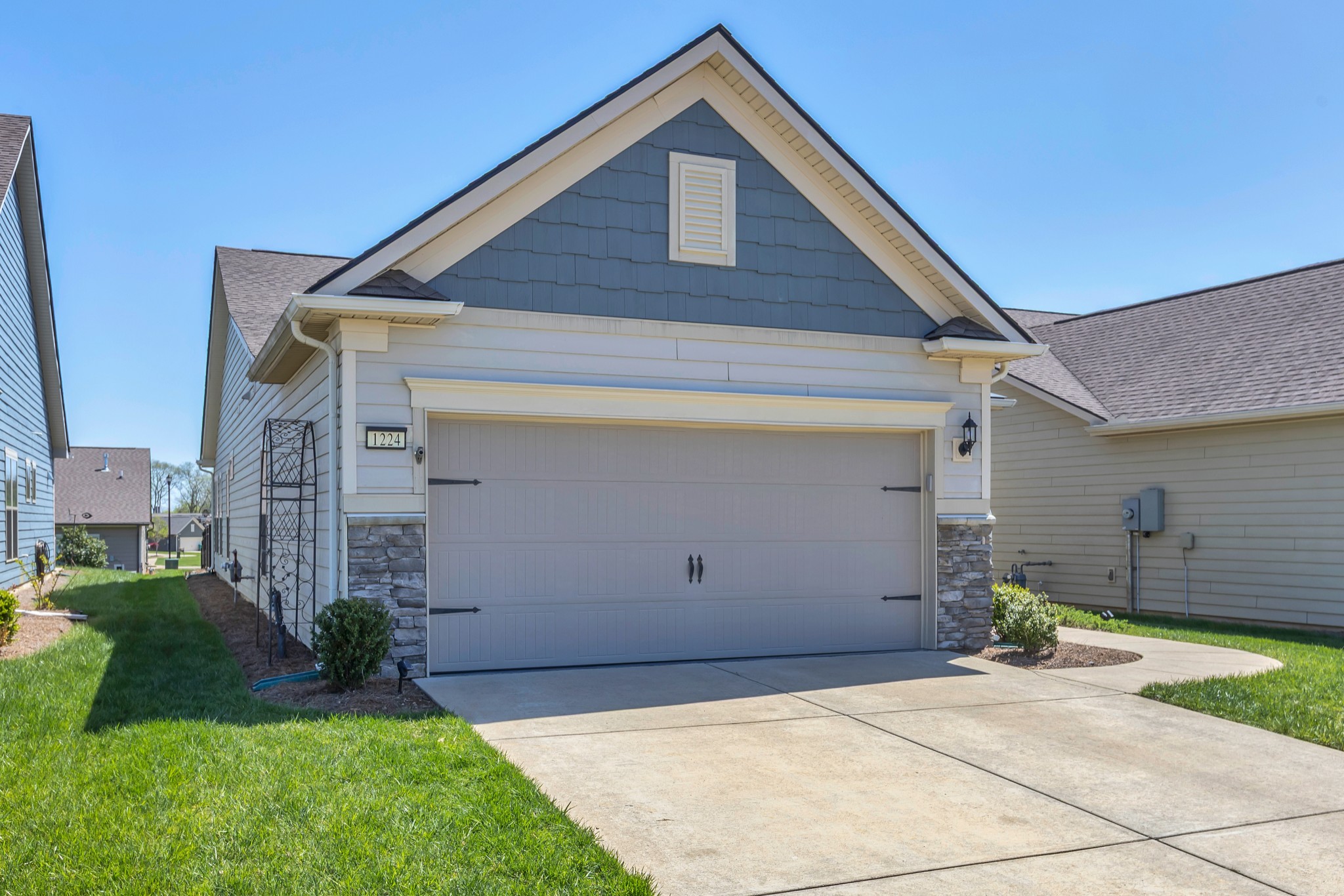 1224 Del Webb Boulevard Spring Hill, TN 37174 - Photo 4 of 47 a view of backyard of house with garage