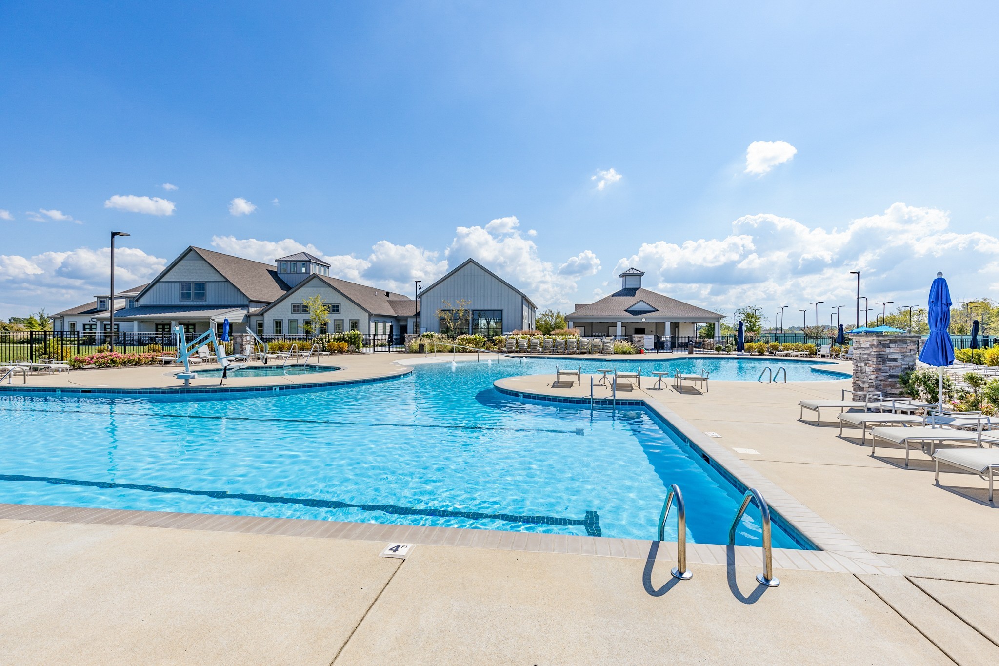 1224 Del Webb Boulevard Spring Hill, TN 37174 - Photo 45 of 47 a view of a swimming pool with lawn chairs