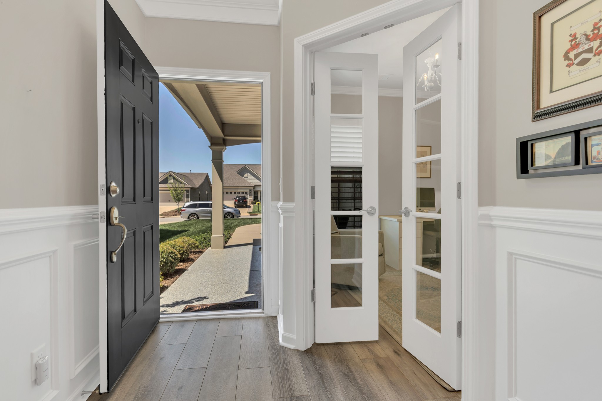1224 Del Webb Boulevard Spring Hill, TN 37174 - Photo 6 of 47 a view of a hallway with wooden floor and entryway