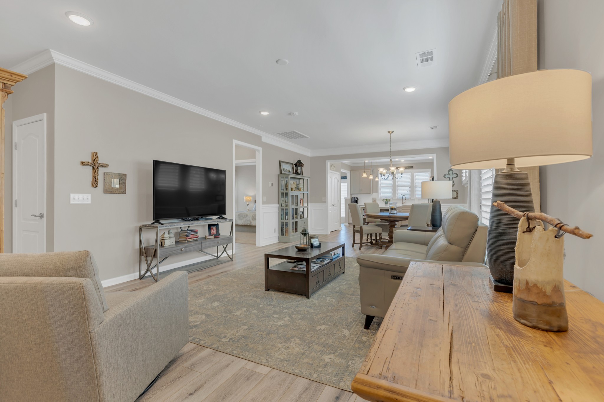 1224 Del Webb Boulevard Spring Hill, TN 37174 - Photo 9 of 47 a living room with furniture and a flat screen tv