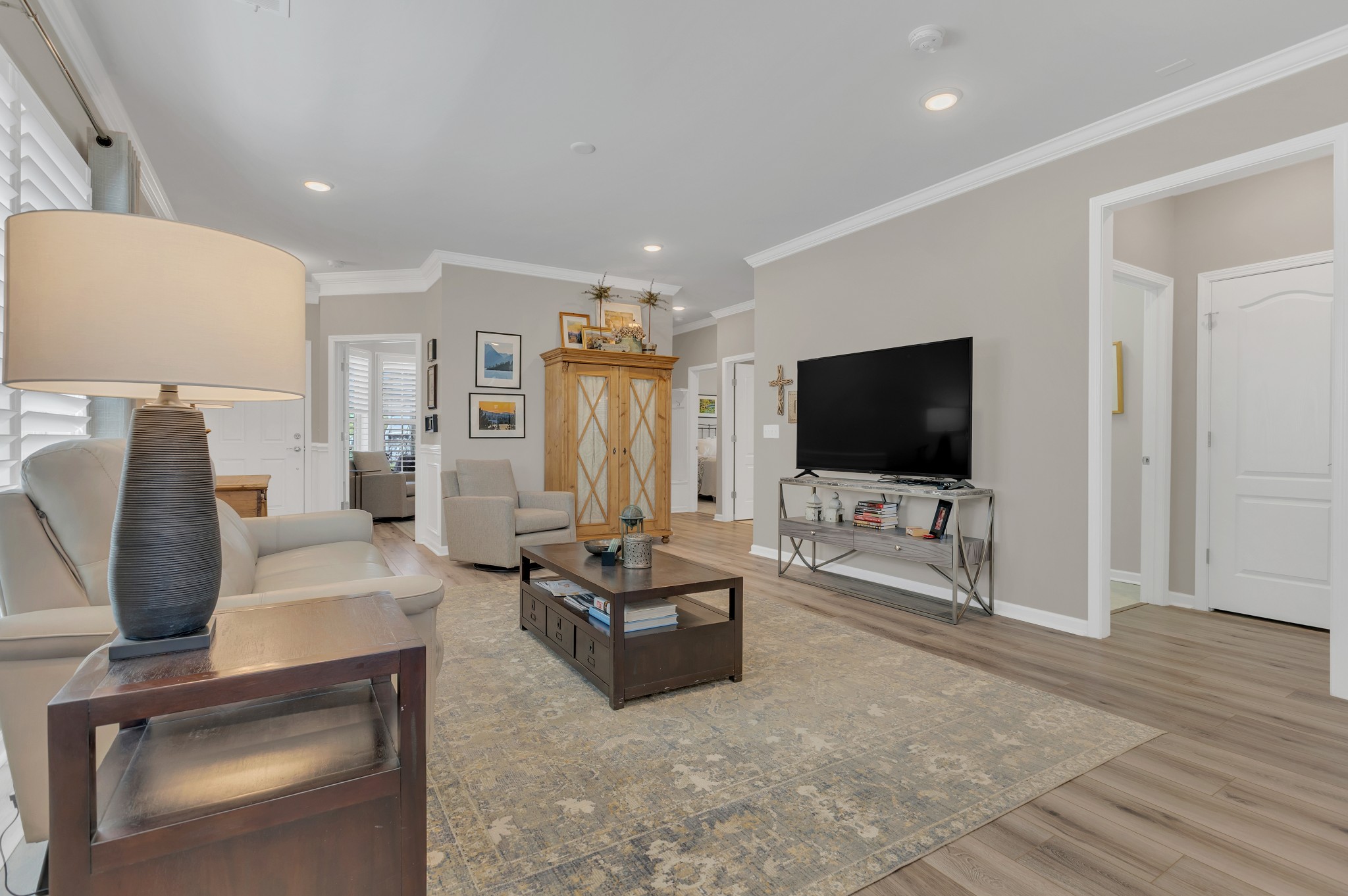 1224 Del Webb Boulevard Spring Hill, TN 37174 - Photo 10 of 47 a living room with furniture and a flat screen tv