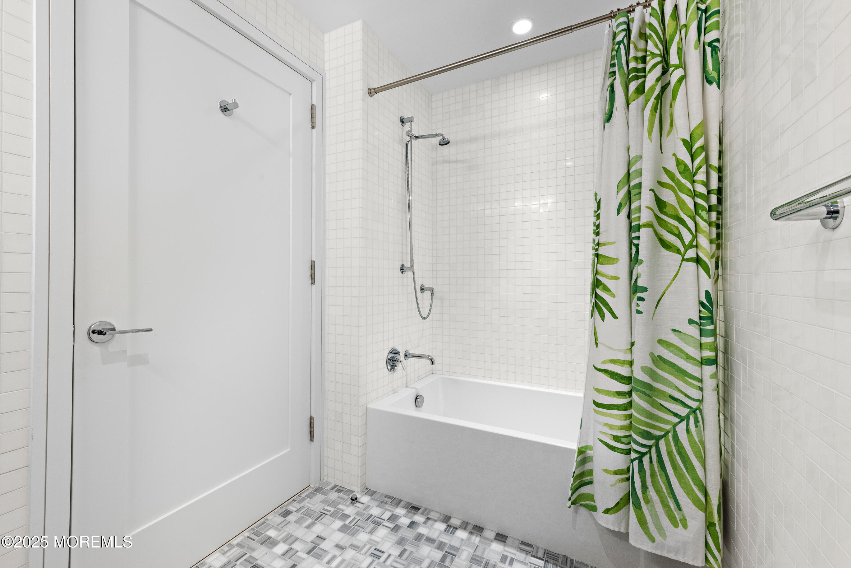 20 Melrose Terrace, Unit 511 Long Branch, NJ 07740 - Photo 23 of 35 a bathroom with a bathtub and a shower