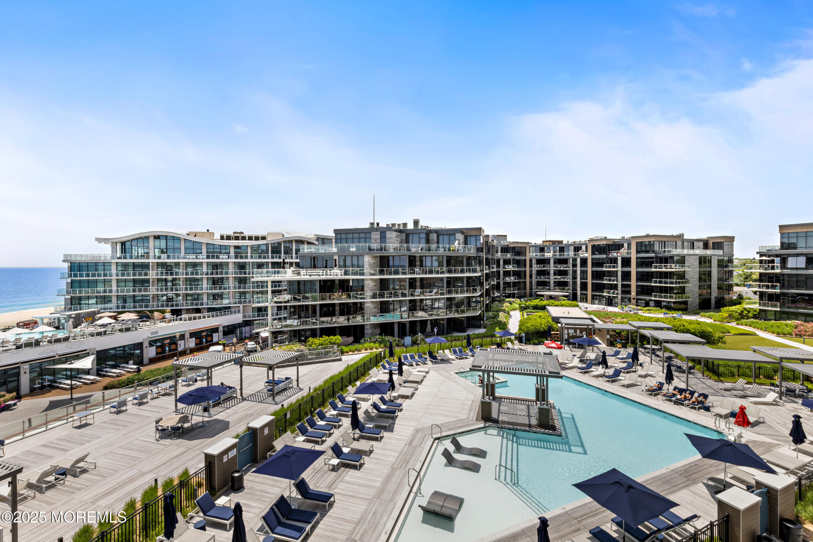 20 Melrose Terrace, Unit 511 Long Branch, NJ 07740 - Photo 25 of 35 a view of city from balcony with outdoor seating