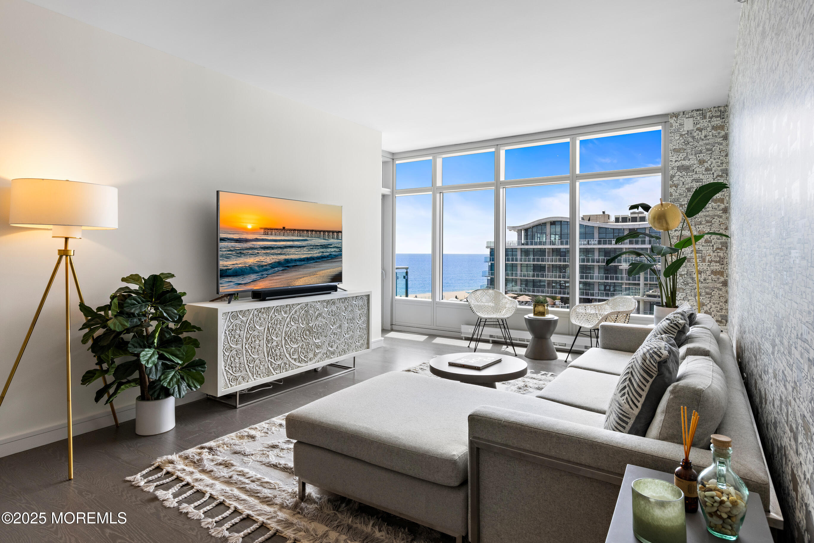 20 Melrose Terrace, Unit 511 Long Branch, NJ 07740 - Photo 3 of 35 a living room with furniture and a flat screen tv