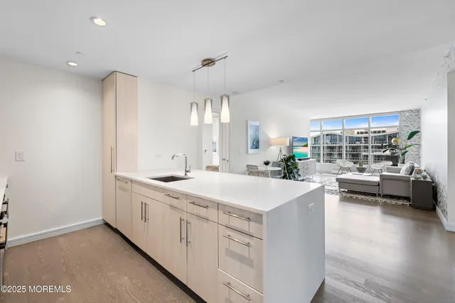 a view of a kitchen counter top space with granite countertop lots of counter top space