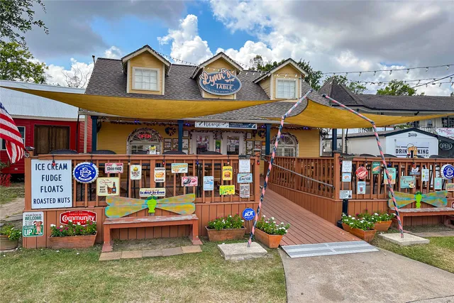 a view of a chairs and table in the patio