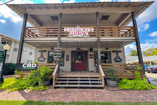 an aerial view of residential house with outdoor space