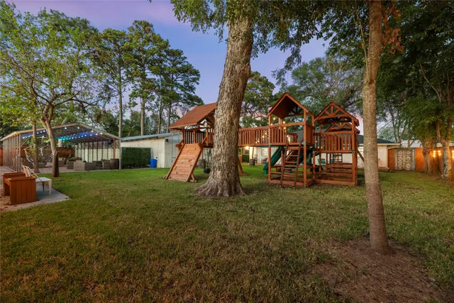 a view of a house with a back yard