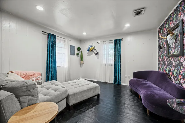 a bedroom with furniture and a couch