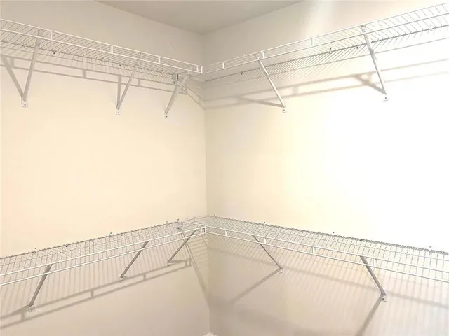 a view of a room with racks on the wall