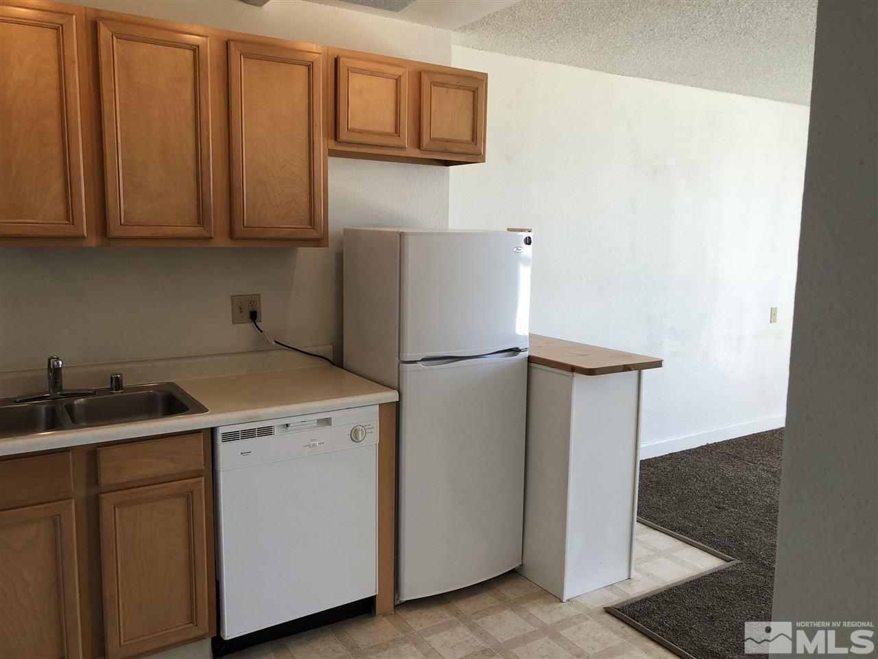 567 West 4th Street, Unit 601 Reno, NV 89503 - Photo 4 of 9 a utility room with dryer and washer