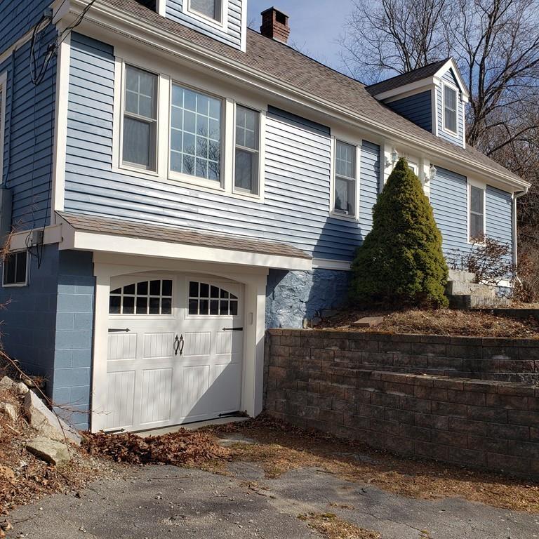 102 Mason Road Dudley, MA 01571 - Photo 3 of 29 a view of a house with a yard