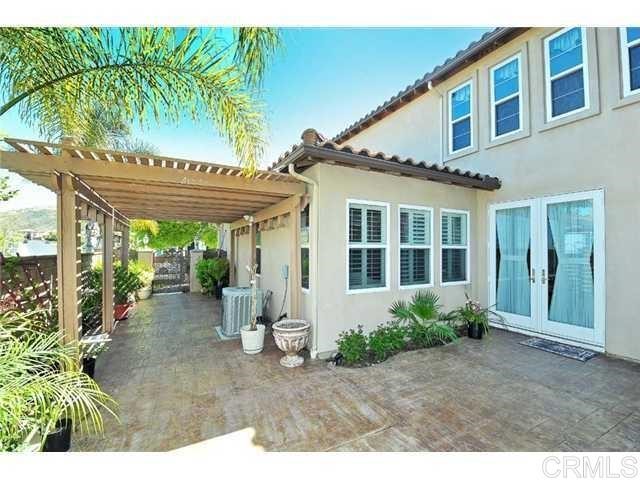 310 Corte Goleta Chula Vista, CA 91914 - Photo 6 of 6 a view of a house with backyard and porch