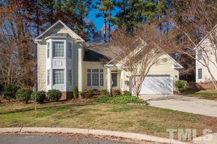5624 Barham Court Raleigh, NC 27613 - Photo 1 of 19 a front view of a house with garden