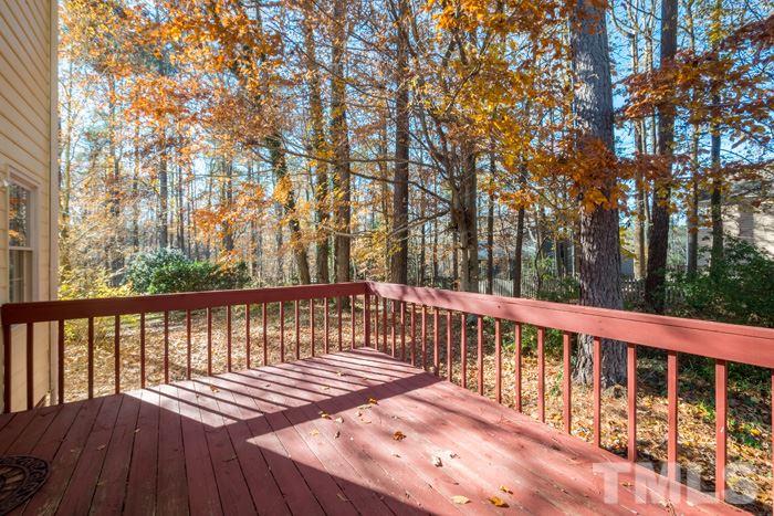 5624 Barham Court Raleigh, NC 27613 - Photo 17 of 19 a view of balcony with wooden floor and outdoor space