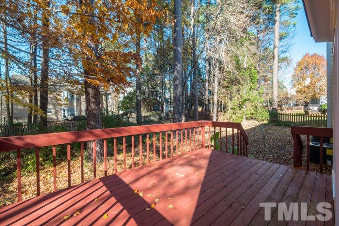 5624 Barham Court Raleigh, NC 27613 - Photo 18 of 19 a view of a wooden deck with furniture