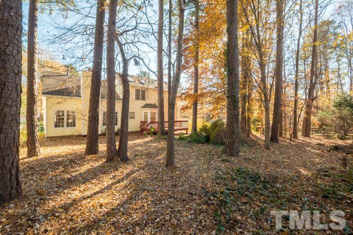 5624 Barham Court Raleigh, NC 27613 - Photo 19 of 19 a view of a yard with trees