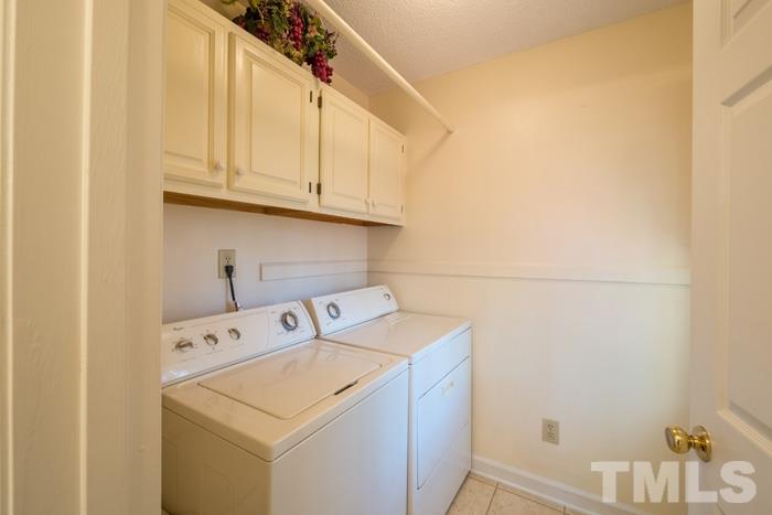 5624 Barham Court Raleigh, NC 27613 - Photo 10 of 19 a utility room with dryer and washer