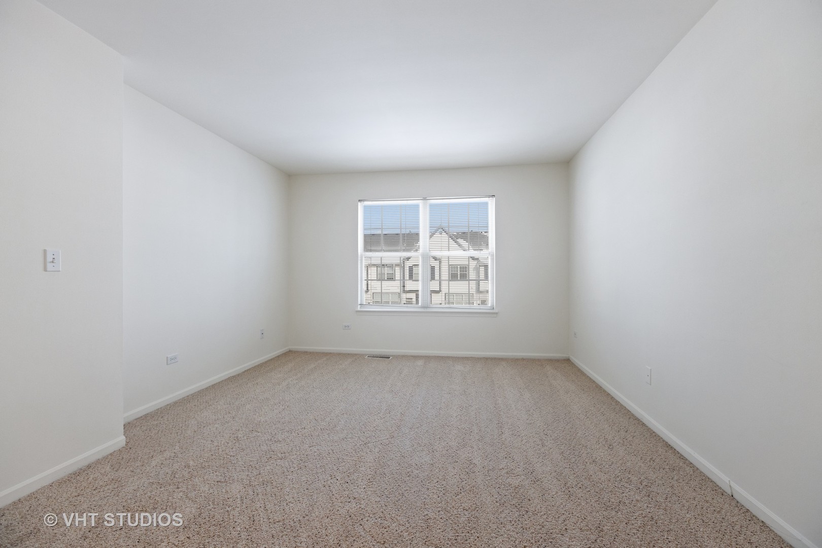 136 Beethoven Court, Unit 136 Wheaton, IL 60189 - Photo 11 of 61 an empty room with a window