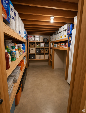 1020 Wilmar Place Centerville, UT 84014 - Photo 18 of 22 Dedicated storage area featuring exposed wood ceiling joists and concrete flooring