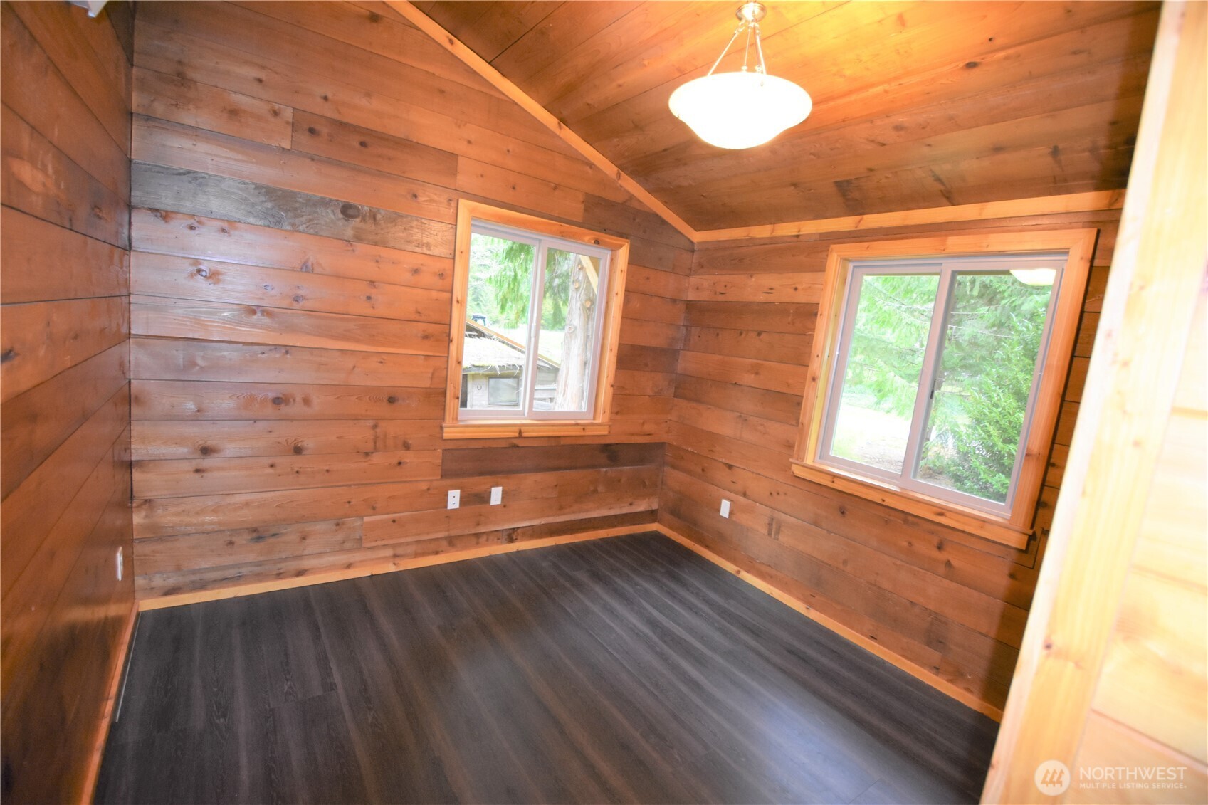 30331 Heimer Road Arlington, WA 98223 - Photo 30 of 37 a view of a room with wooden floor and a window