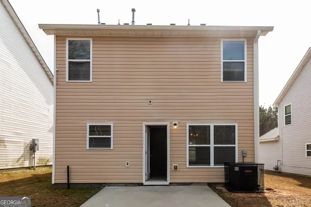 a view of front of house with large window