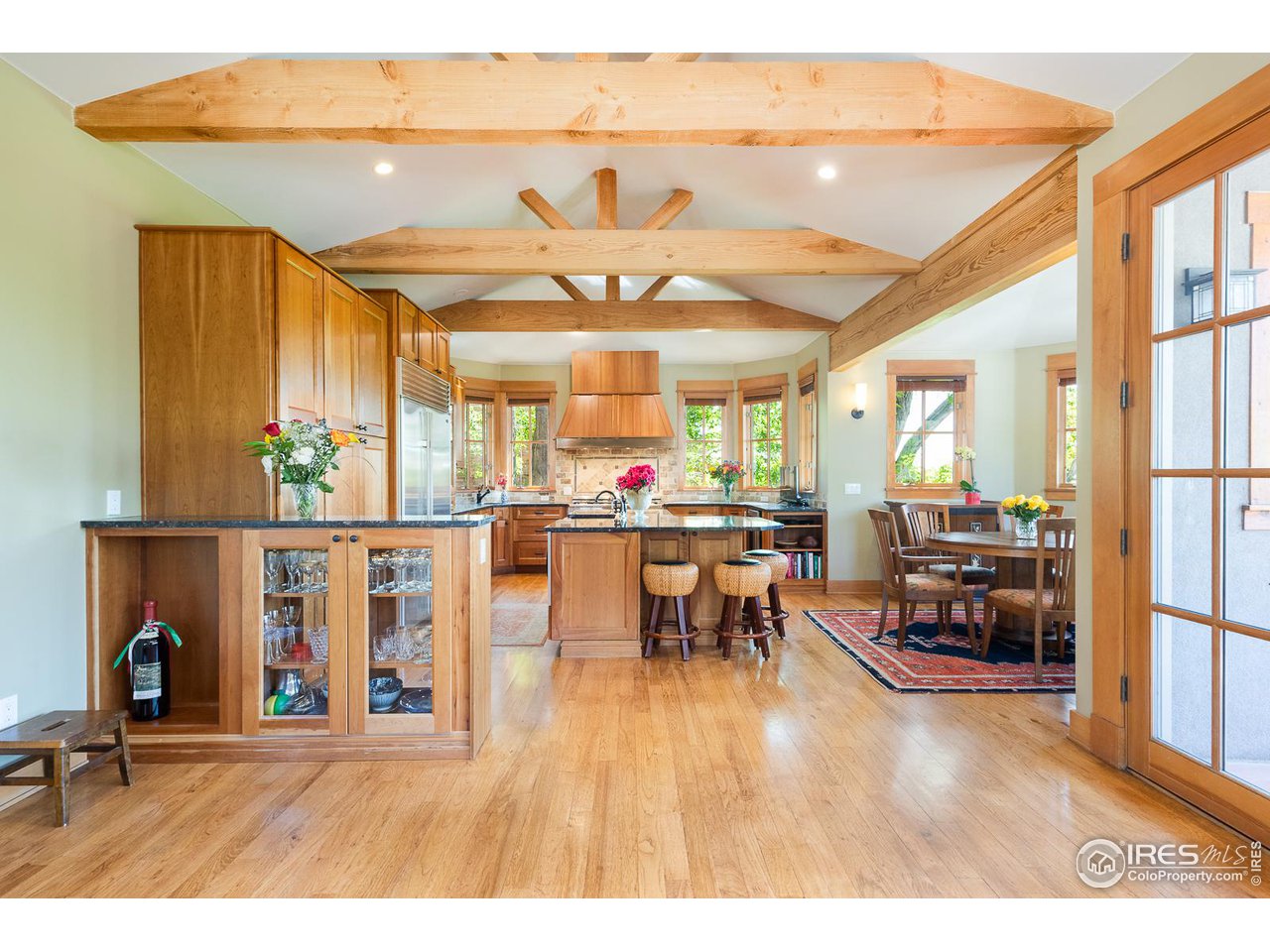 520 Spruce Street Boulder, CO 80302 - Photo 11 of 40 a living room with furniture a fireplace and a large window