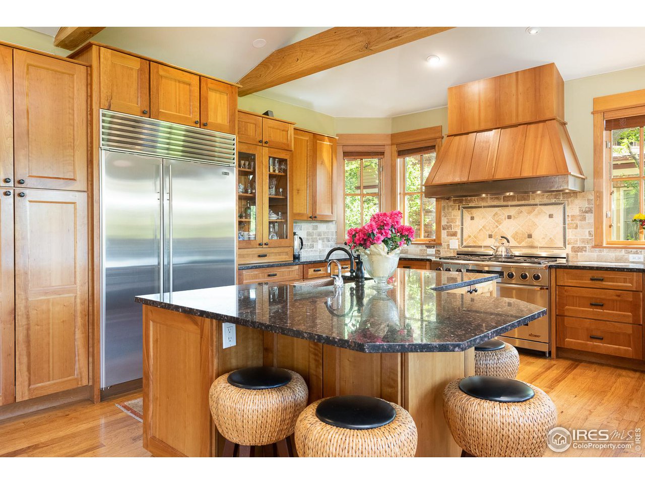 520 Spruce Street Boulder, CO 80302 - Photo 14 of 40 a kitchen with refrigerator and stove