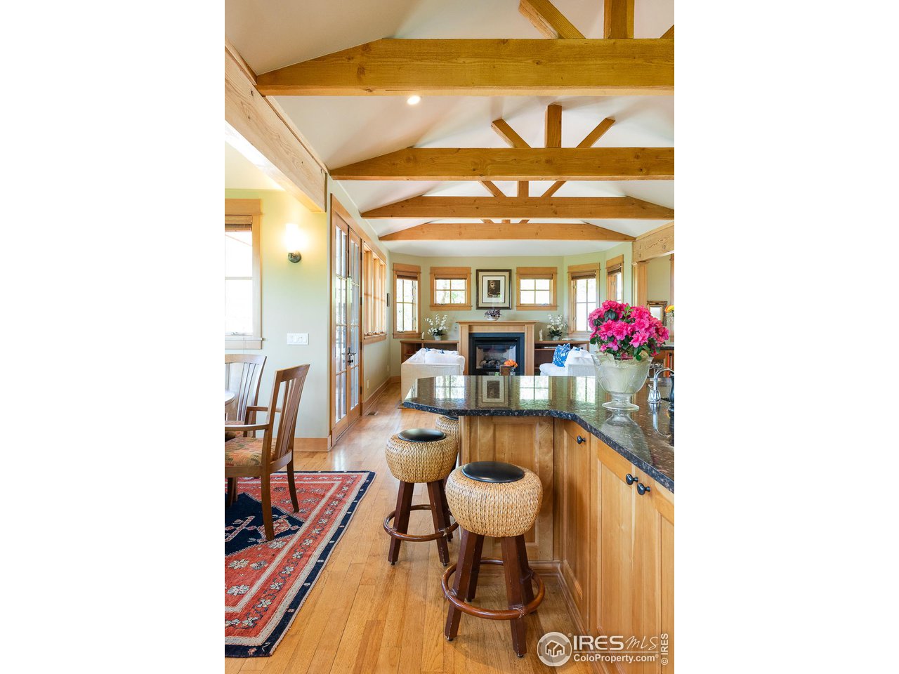 520 Spruce Street Boulder, CO 80302 - Photo 15 of 40 a dining room with furniture and a chandelier