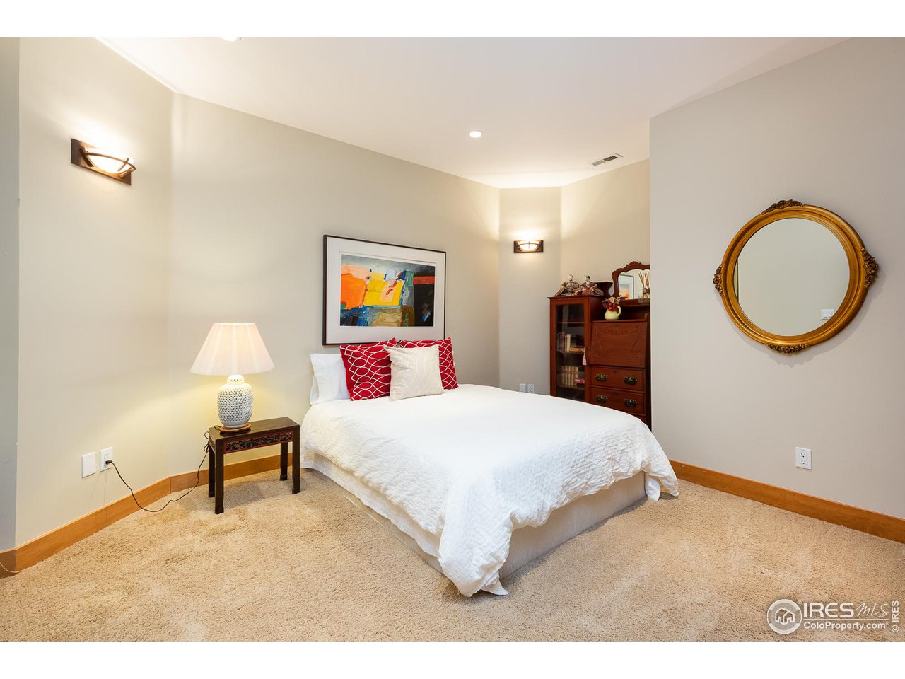 520 Spruce Street Boulder, CO 80302 - Photo 26 of 40 a bedroom with a bed and a chair